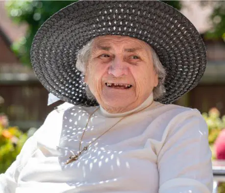 ACI Care | an image of one of our residents outside in the sun