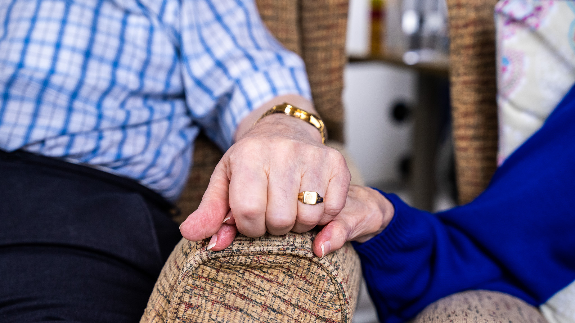 Don and Joan holding hands