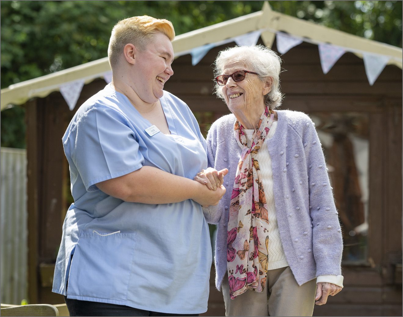 Our care worker chatting to a resident