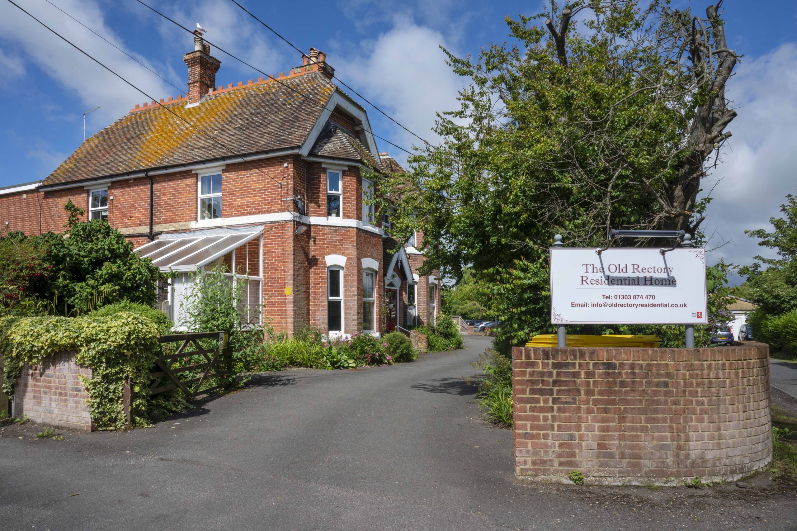 ACI Care | Exterior view of Old Rectory Care Home Dymchurch, showcasing its welcoming entrance and surroundings