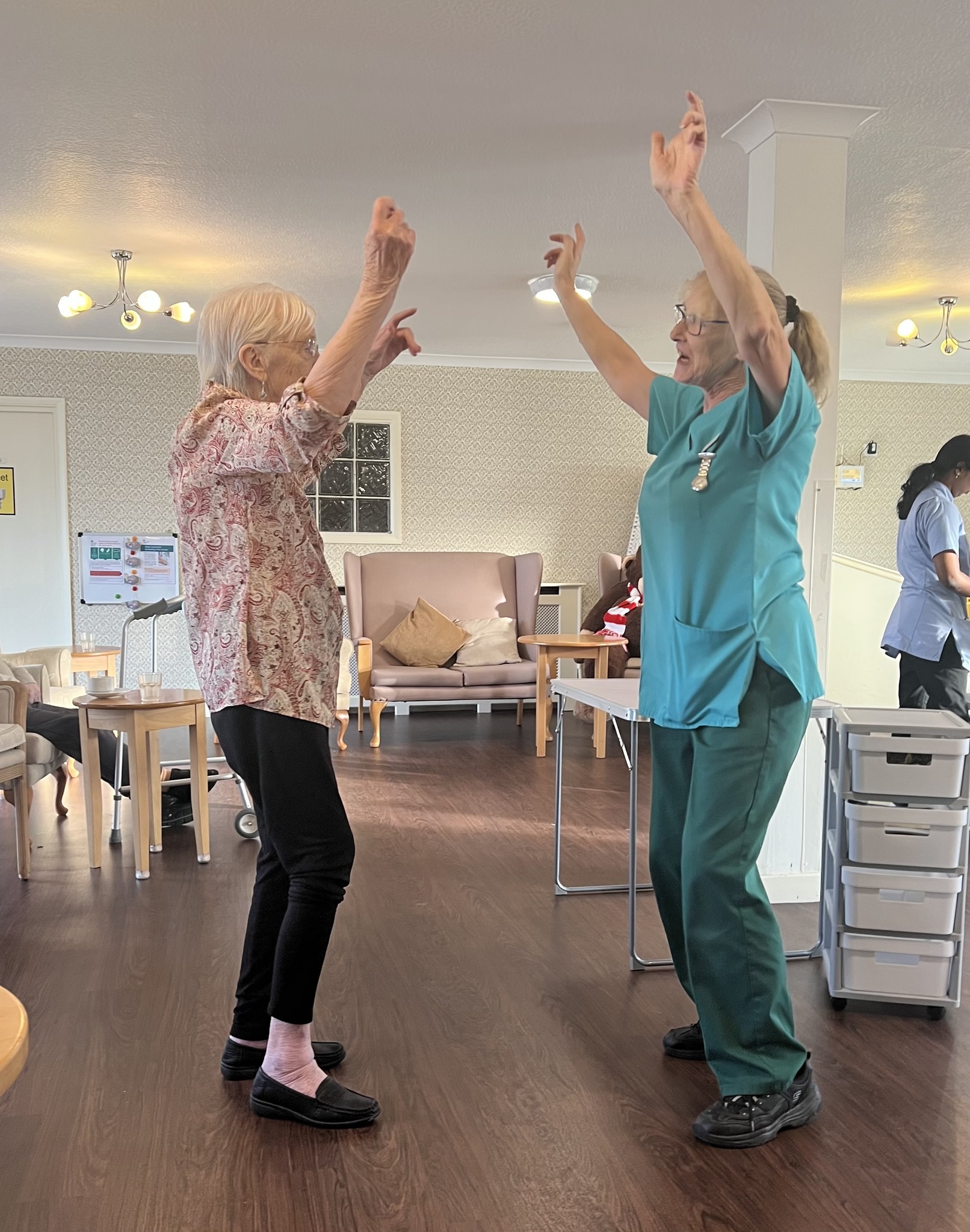 East Sussex Care Home | A resident dancing with a care worker