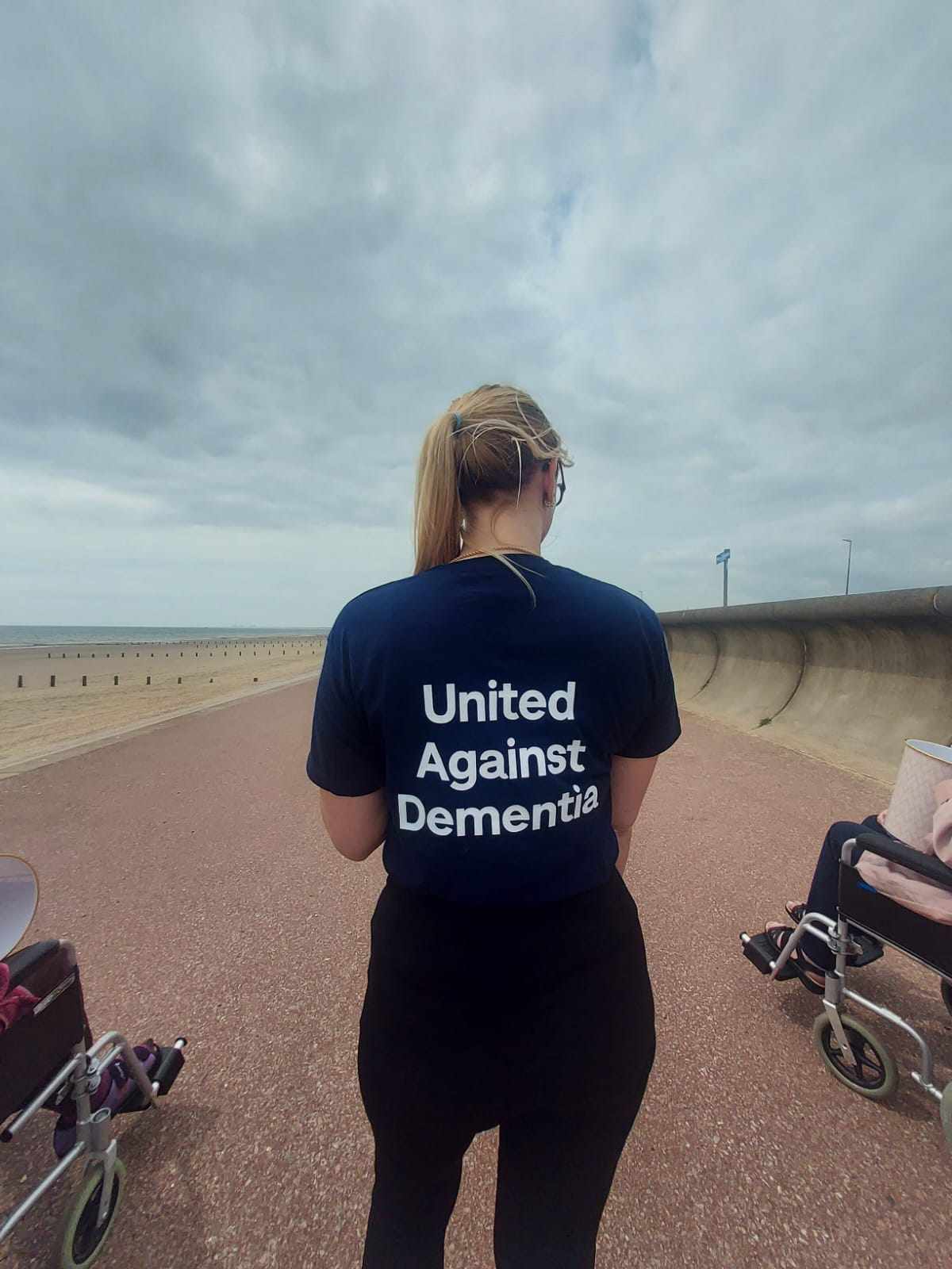 Fundraising for Alzheimer's | A team member wearing a t-shirt saying 'United Against Dementia'