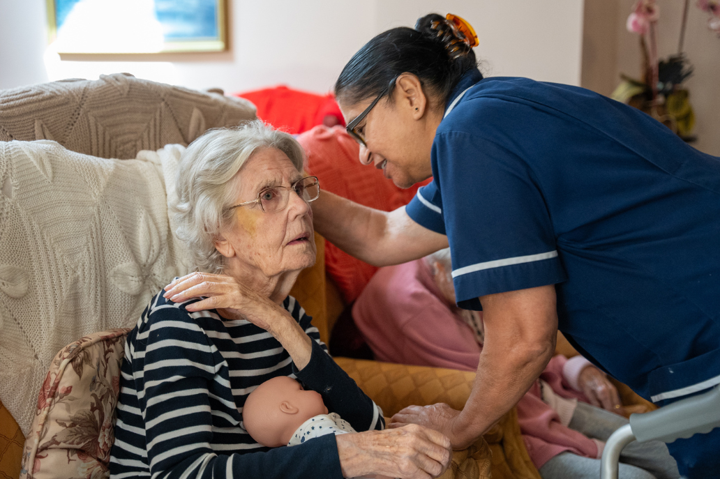 carer talking to resident for alzheimers care