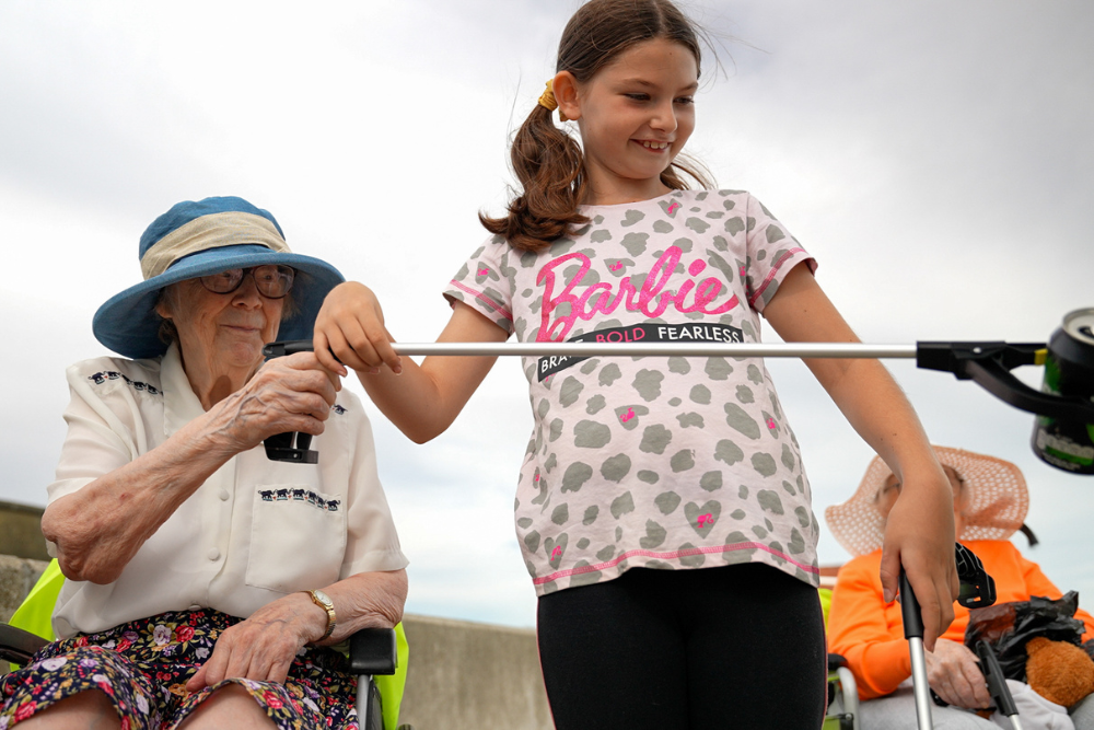 young volunteer helping to clean beaches