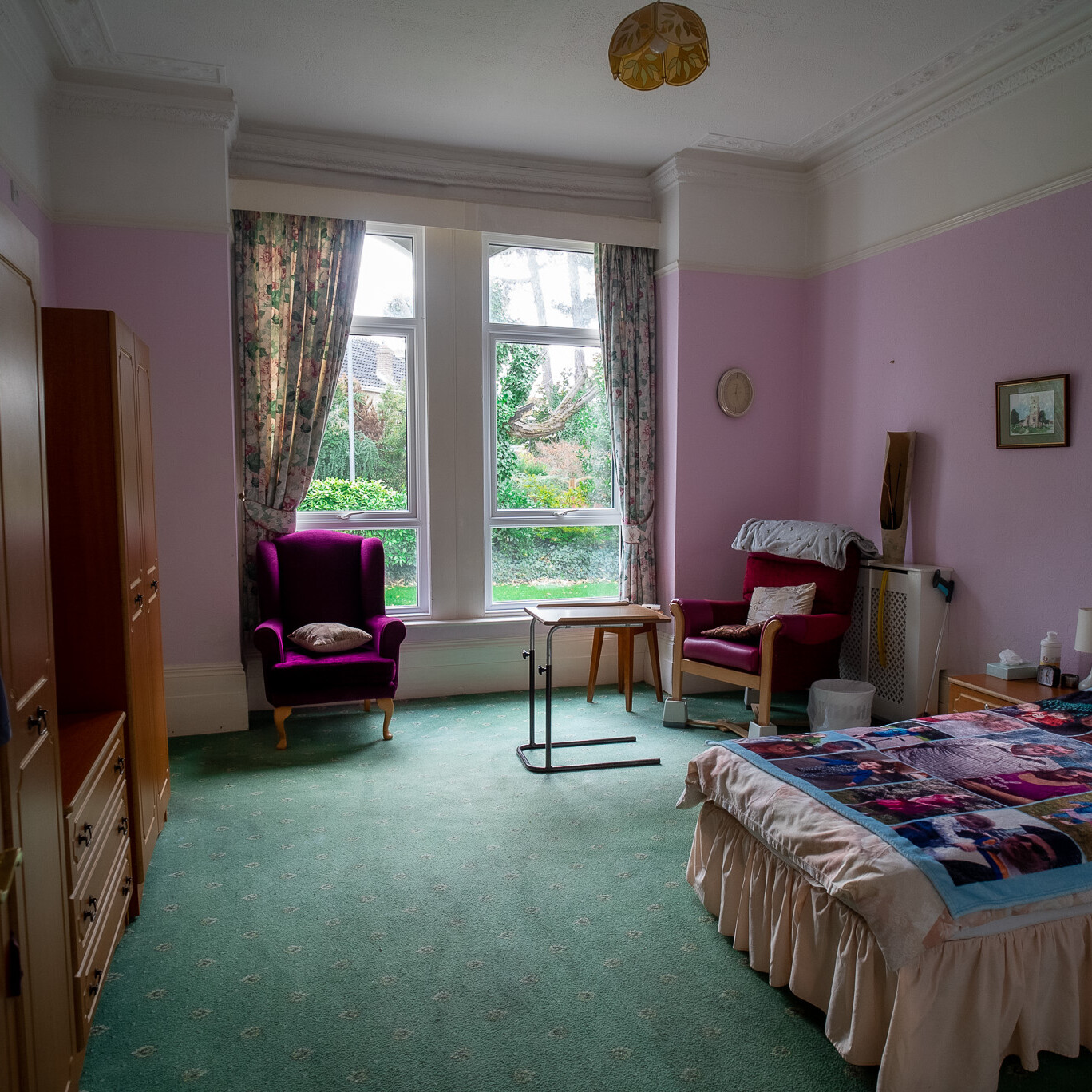 ACI Care | A resident's room at Mountside Care Home Hastings with a beautiful view into the gardens, providing comfort and tranquility.