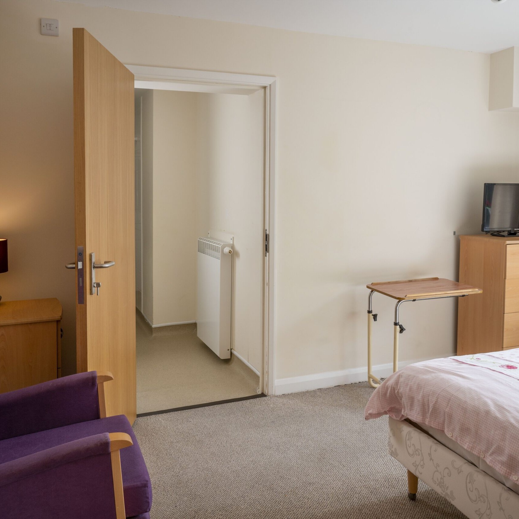 ACI Care | An inside view of a resident's room at Mountside Care Home Hastings, designed for comfort and relaxation.