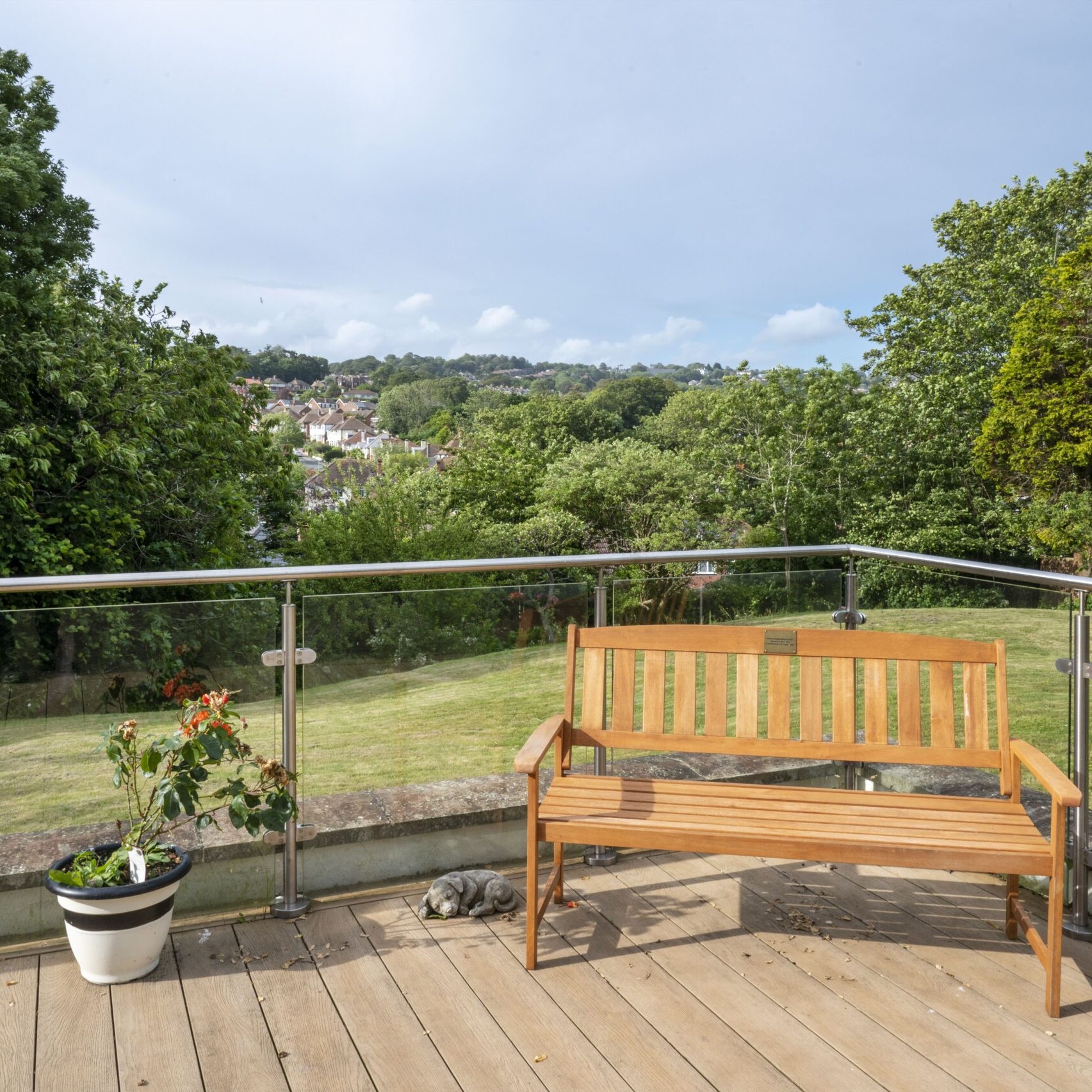 ACI Care | Outdoor furniture on the decking at Mountside Care Home Hastings, providing a relaxing space for residents