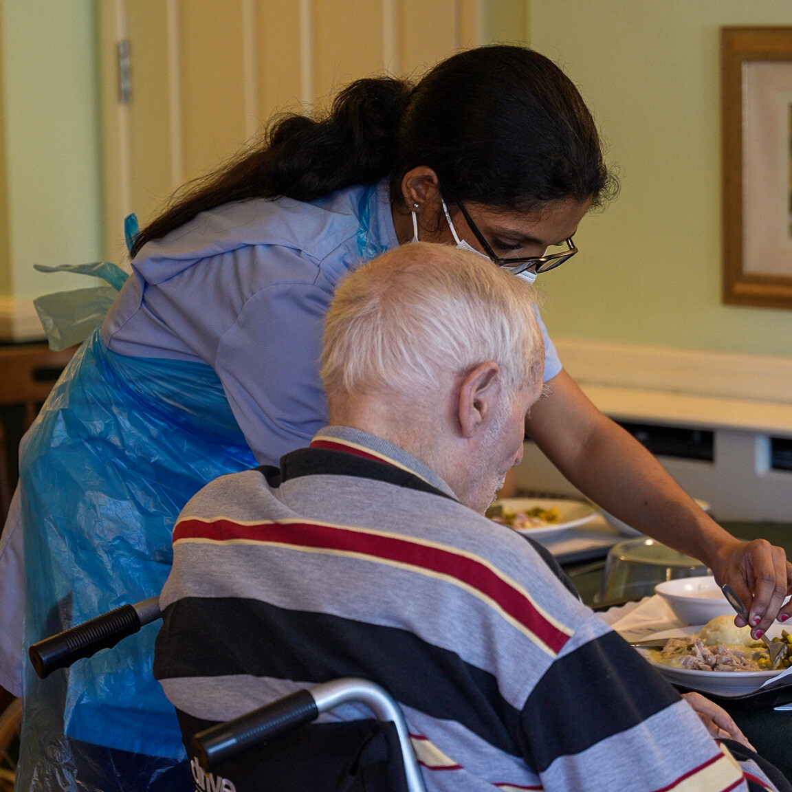 ACI Care | Staff members at Mountside Care Home Hastings engaging with residents, providing compassionate care and support.